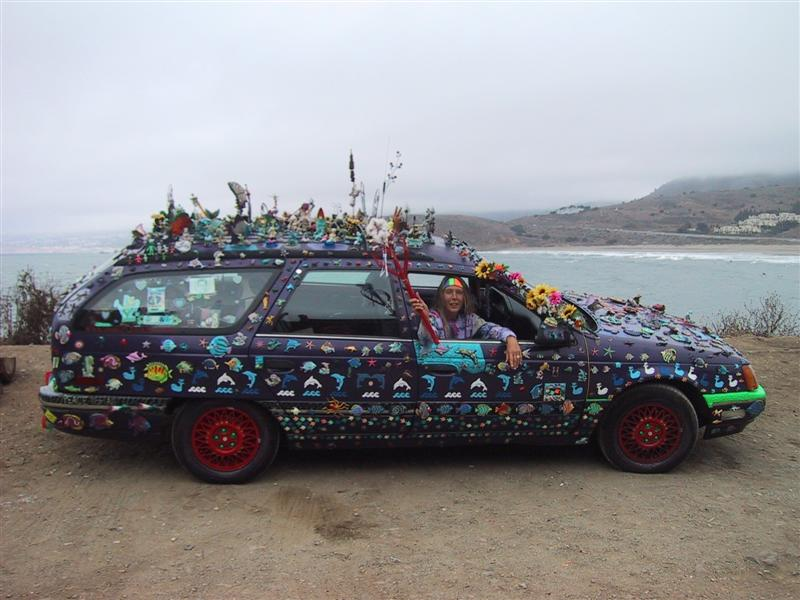 Illustration for article titled Groovalicious Purple Princess Of Peace Art Car Falls On Hard Times, Faces Crusher